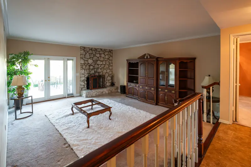 Living room fireplace from the stair landing